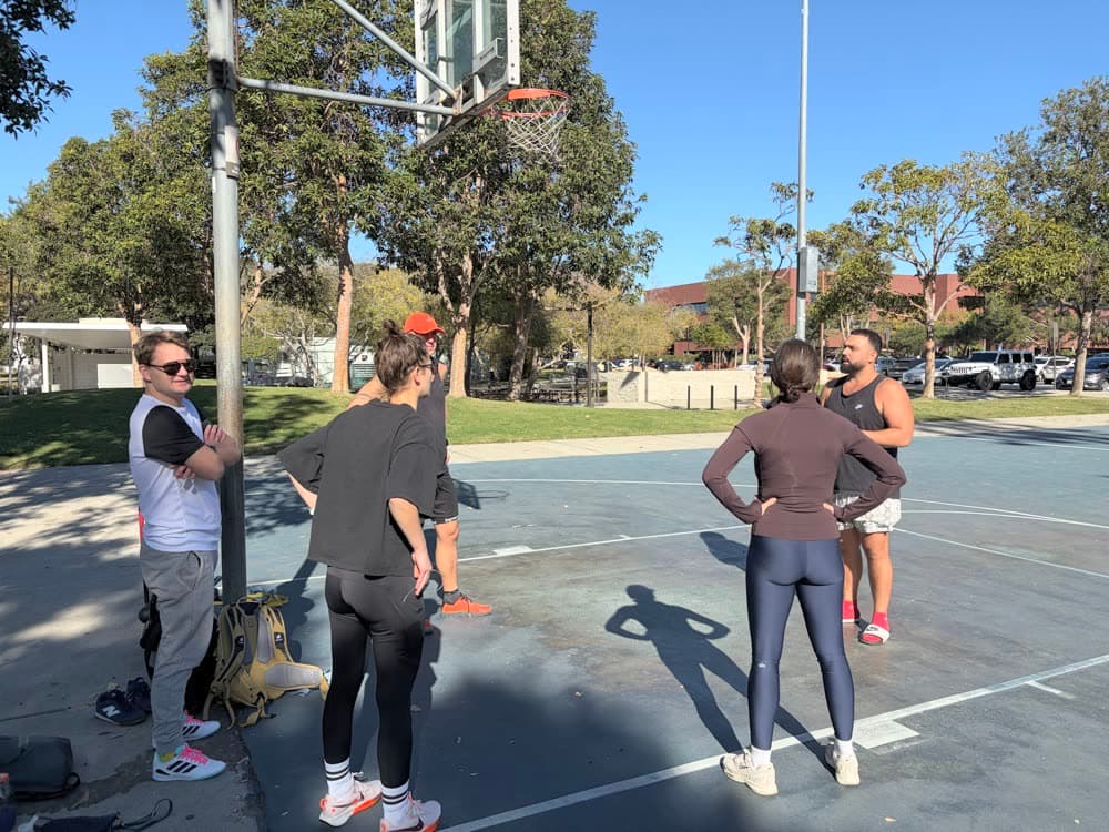 The team together on a basketball court
